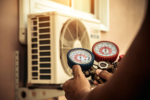 Professional Heat Pump Repair technician working in Holmes, PA